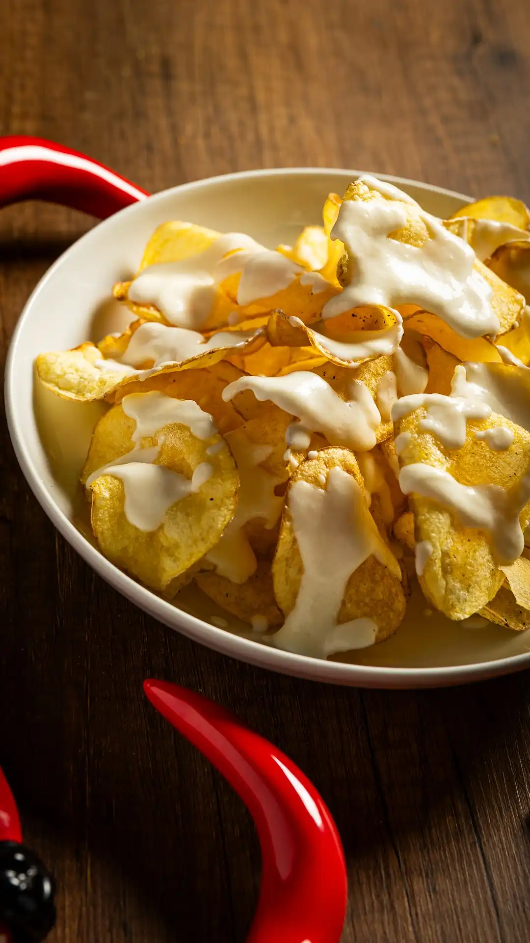 CHIPS DI PATATE HOMEMADE CON FONDUTA DI PARMIGIANO REGGIANO